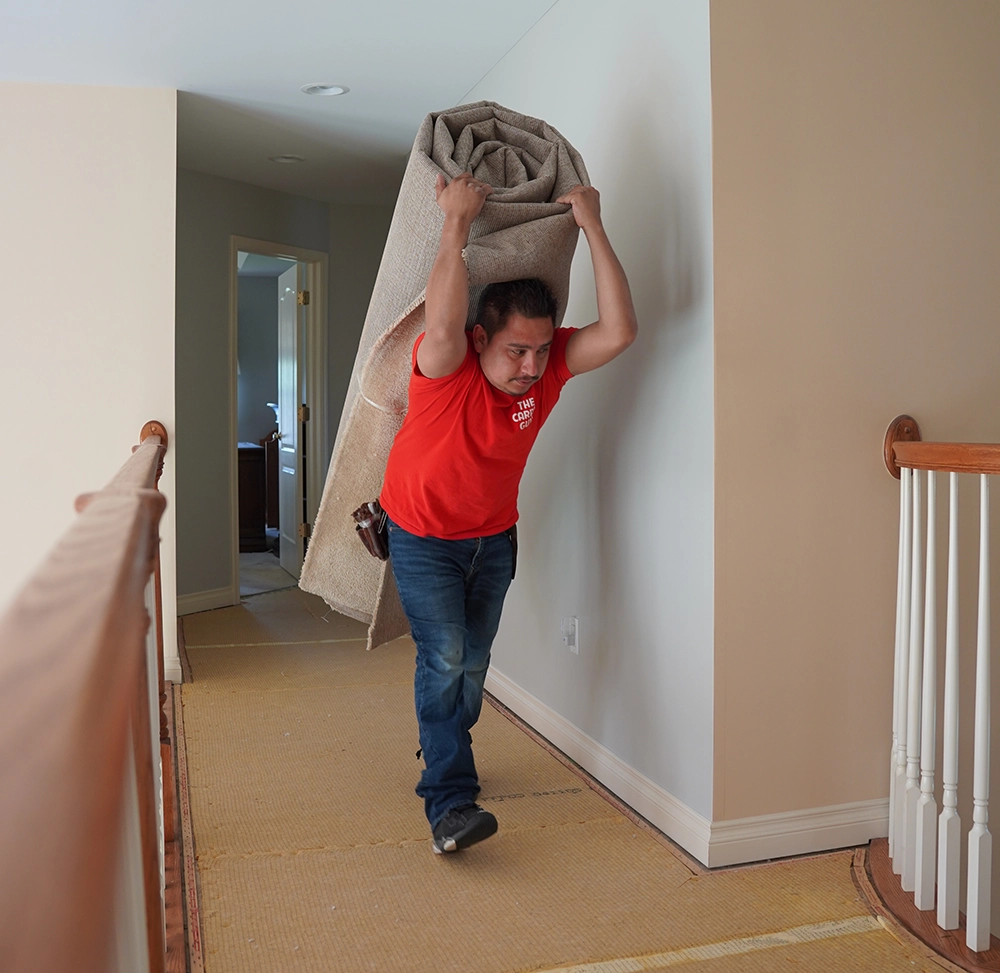 Man Removing Carpet