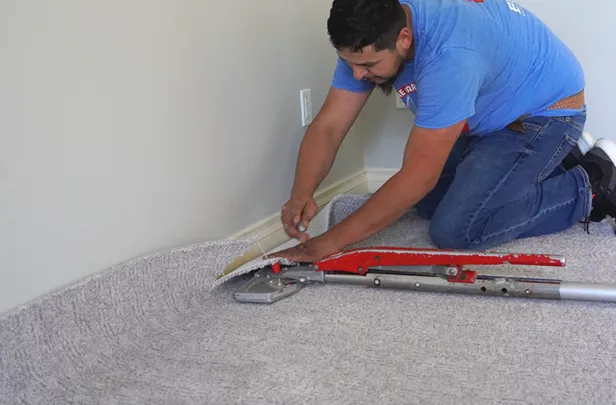 Man Installing Carpet