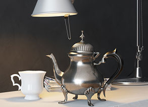 silver teapot and teacup