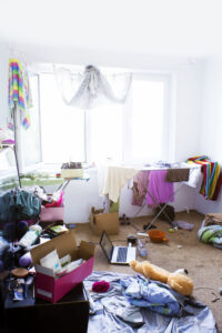 messy room with matted flooring